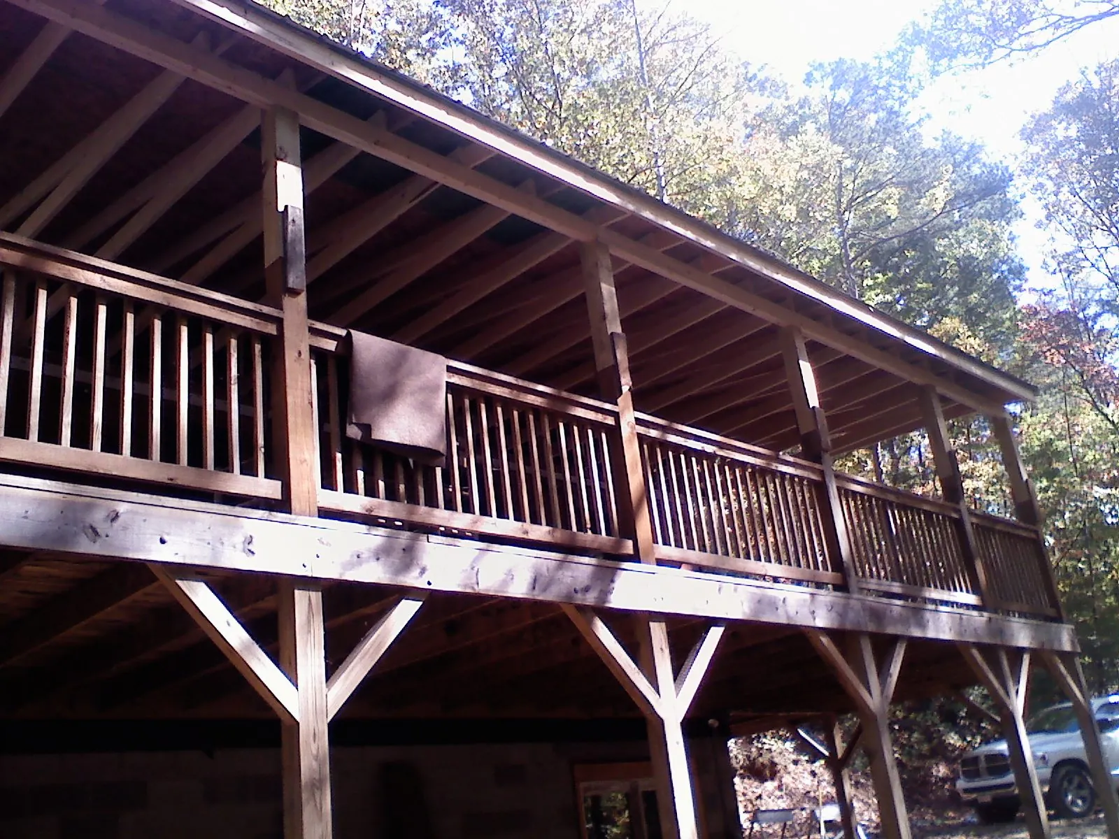 Timber framing under a new elevated porch and deck — Roof Leak Repair in Wakeman by Roofing Brothers